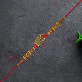 Antique Peacock Feather Rakhi With Beaded Thread