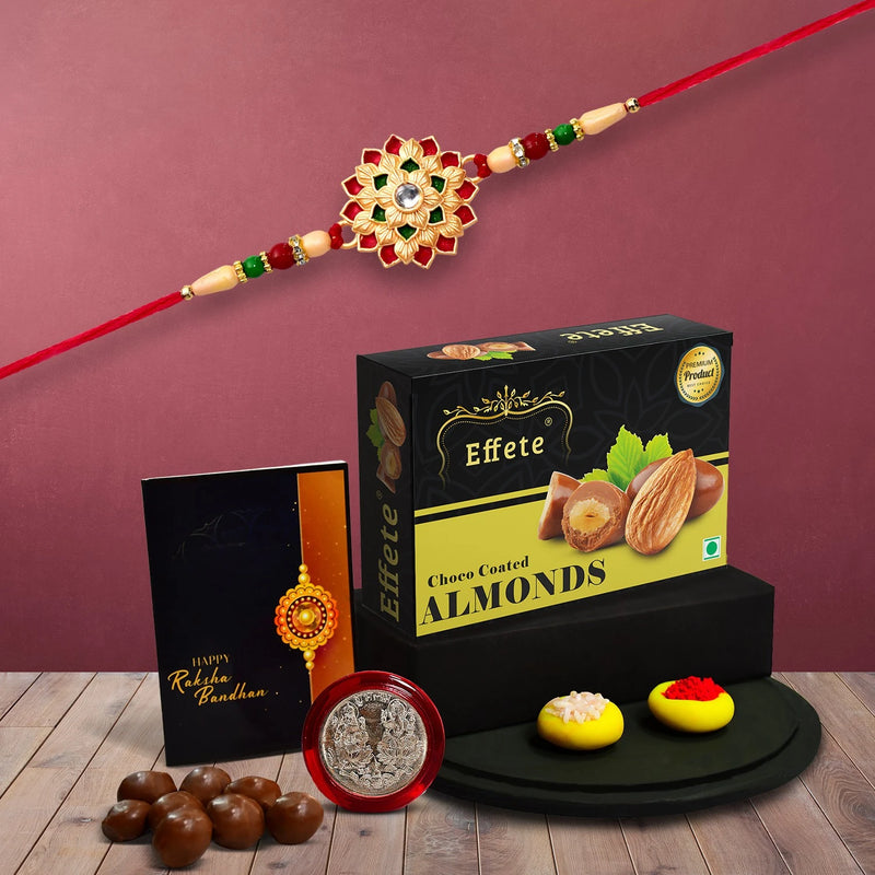 Premium Rakhi Gift Combo With Floral Rakhi Choco Coated Almonds Silver Coin Tilak Set  Greeting Card For Brother