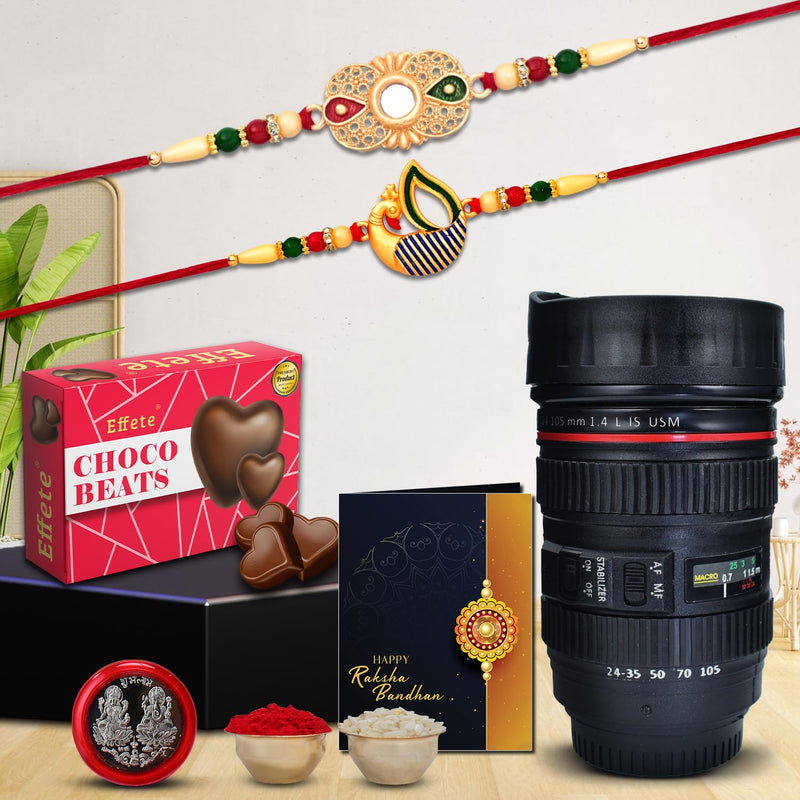 Design Rakhi For Brother  Peacock Rakhi For Brother  Rakhi Combo Chocolate Beats 32gm  Camera Lens Coffee Mug With Pooja Coin  Greeting Card (K2_277+282_m720+cb32)