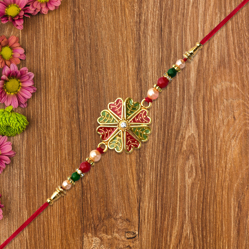 Traditional Rakhi With Bright Floral Centerpiece And Decorative Thread